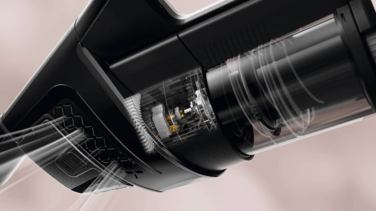 Das Bild zeigt eine Detailaufnahme eines beutellosen Staubsaugers. Sichtbar sind das transparente Gehäuse mit Filter und Motor, durch das die Luftströmung und die Technik im Inneren erkennbar werden. Das Design ist modern und technisch hochwertig.