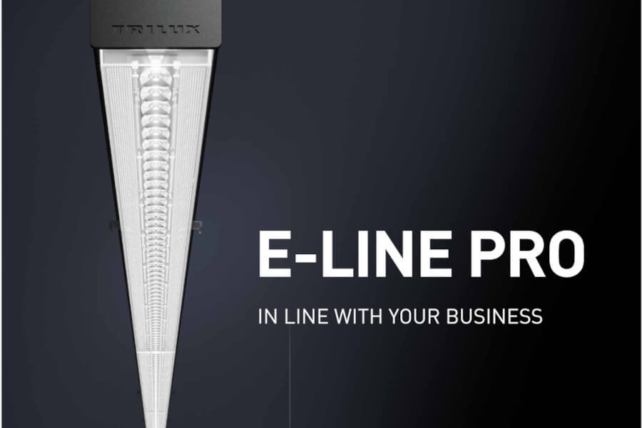 Inspirationen TRILUX E-Line Pro Das Bild zeigt den Ausschnitt eines Y-förmigen Leuchtensystems vor dunklem Hintergrund. Im Vordergrund steht der Schriftzug „YONOS“ in Weiß, darunter die Beschreibung „YOUR NEXT OFFICE SYSTEM“.