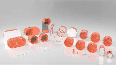 Verschiedene Hohlwanddosen in der Farbe Orange von OBO Bettermann in einer Präsentationsübersicht vor grauem Hintergrund.