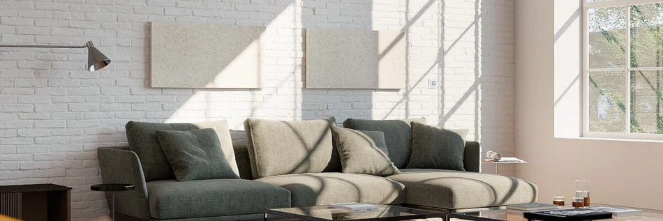 Wohnzimmer mit zwei Infrarotheizungen über dem Sofa