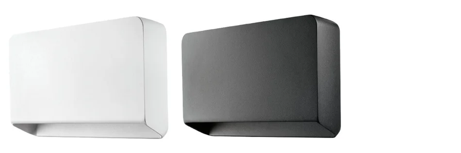 Zwei Boxen, einmal weiß einmal schwarz vor weißem Hintergrund.