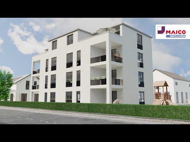 Ein modernes, weißes Mehrfamilienhaus mit angrenzendem Kinderspielplatz.