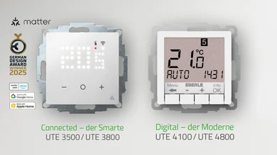 Das Bild zeigt zwei elektronische Heizungsregler mit Display, einer mit LED-Punktraster in Weiß und der andere mit LCD-Anzeige, beide auf Metallträger und mit Bezeichnungen darunter.