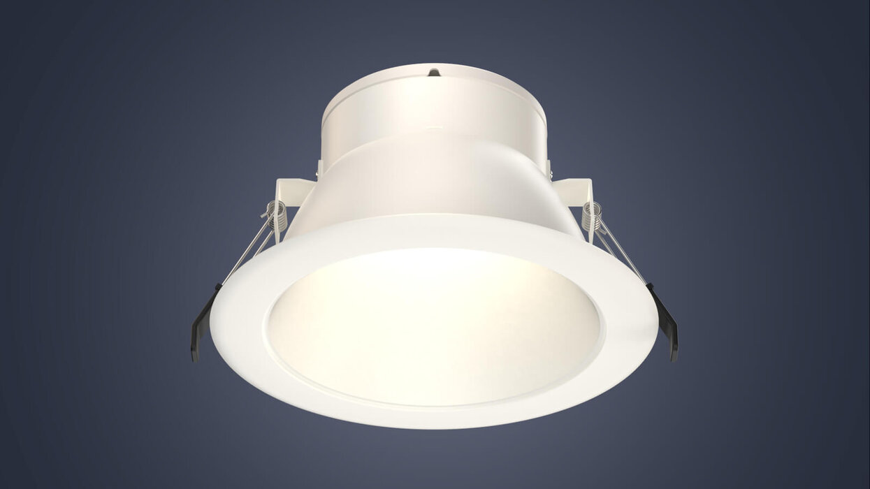 Das Bild zeigt ein rundes, weißes Einbau-Downlight vor einem dunkelblauen Hintergrund.