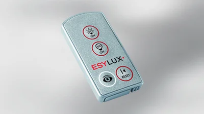 Das Bild zeigt die ESYLUX DEFENSOR Endanwender-Fernbedienung auf weiß-grauem Untergrund