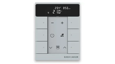 Das Bild zeigt ein silbernes Busch-tenton® Bedienelement.