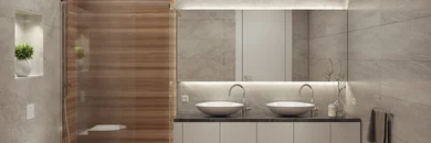 Blick auf einen Badezimmerspiegel mit zwei Waschbecken und Einbaustrahlern.